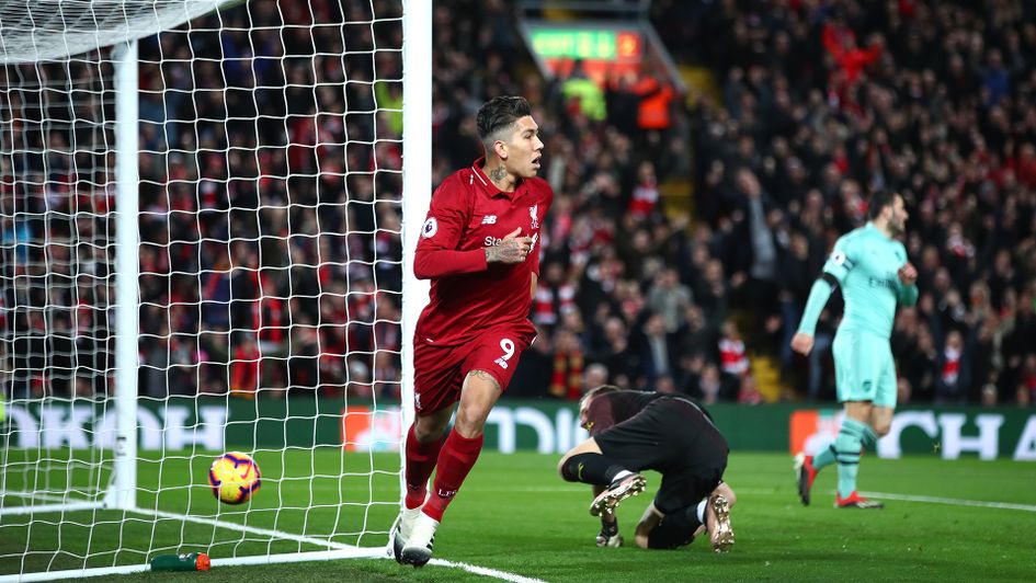 Celebrations for Roberto Firmino after he scores against Arsenal