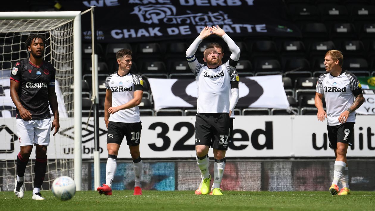Wayne Rooney: Derby ace celebrates after scoring a penalty against Reading in the Sky Bet Championship