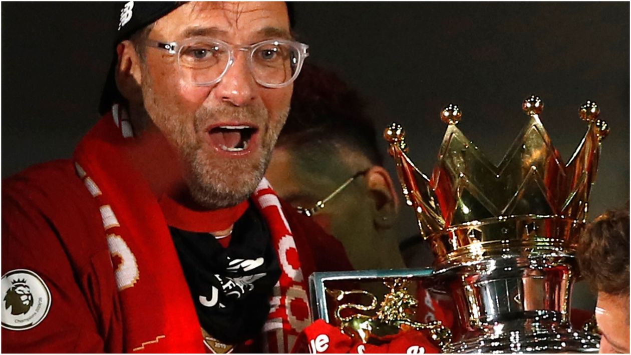 Liverpool manager Jurgen Klopp lifts the Premier League trophy