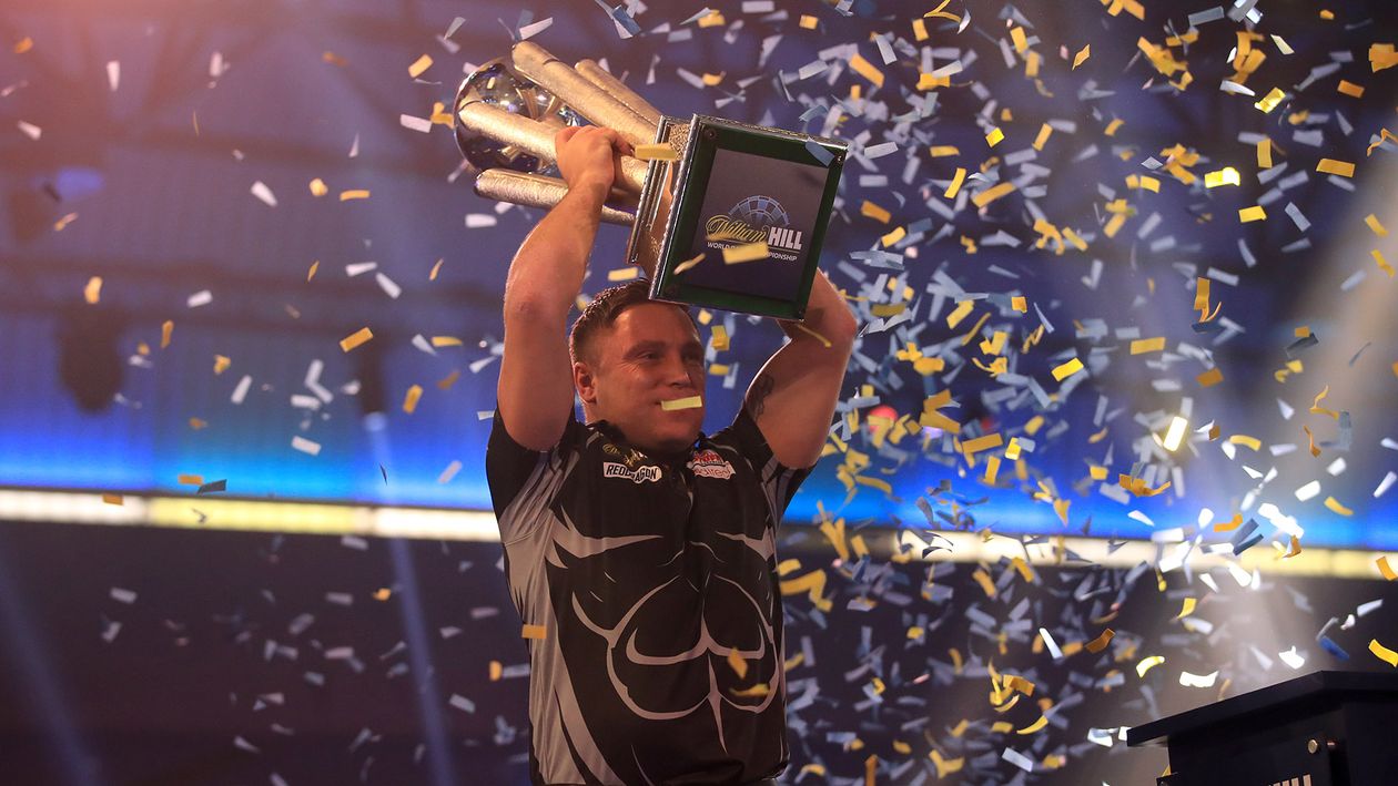 Gerwyn Price lifts the Sid Waddell Trophy after becoming PDC World Darts Champion