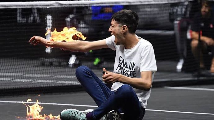 A protestor sets himself on fire