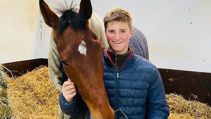 Finn Lambert pictured with stable favourite Ballyandy in his stable