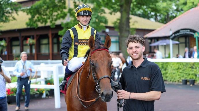 Marco Ghiani celebrates success at Haydock Park aboard Zouky (Grossick Photography)