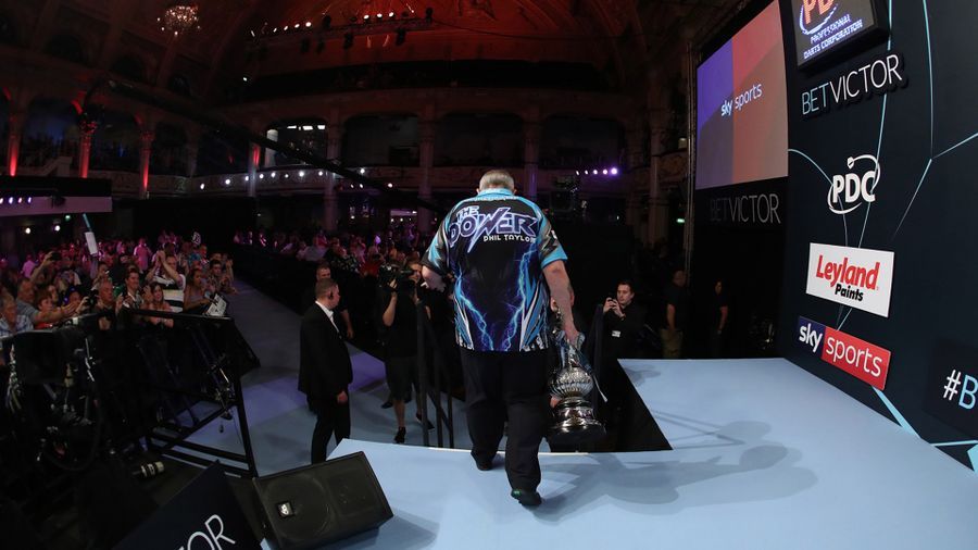Phil Taylor leaves the stage after winning his 16th World Matchplay title (Pic: Lawrence Lustig)