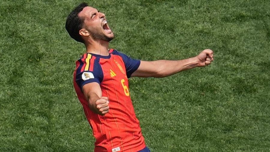 Mikel Merino celebrates for Spain against Belgium