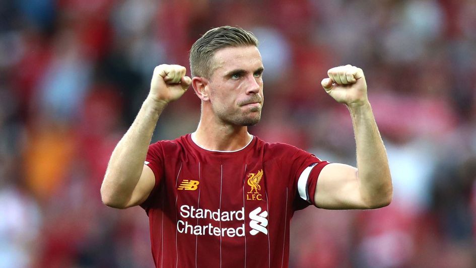 Liverpool captain Jordan Henderson celebrates