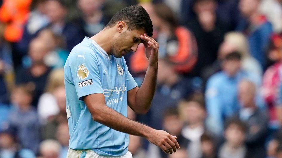 Rodri reacts to his red card