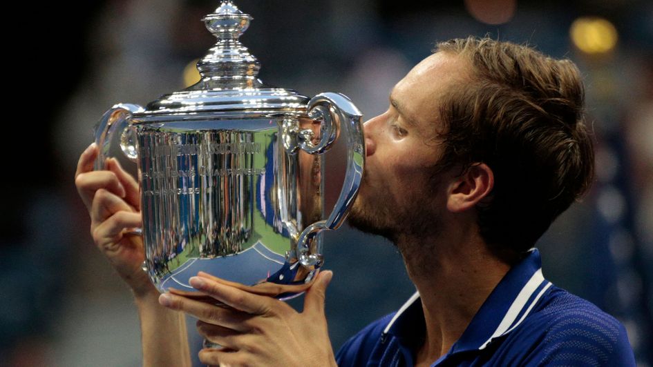 Daniil Medvedev kisses the trophy after winning the 2021 US Open