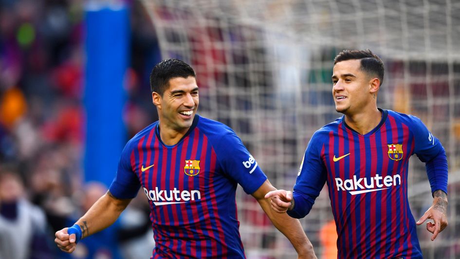 Barcelona duo Luis Suarez (left) and Philippe Coutinho celebrate a goal in El Clasico