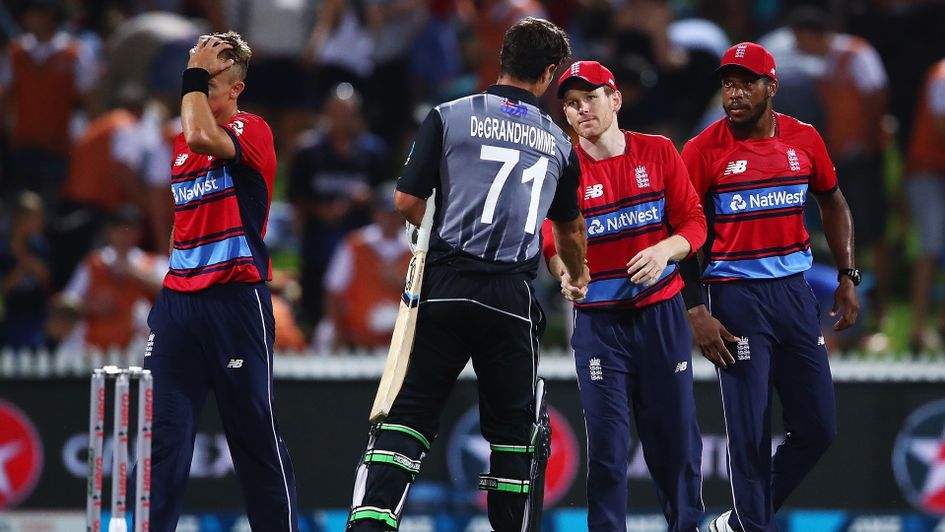 England's Eoin Morgan shakes hands with Colin de Grandhomme