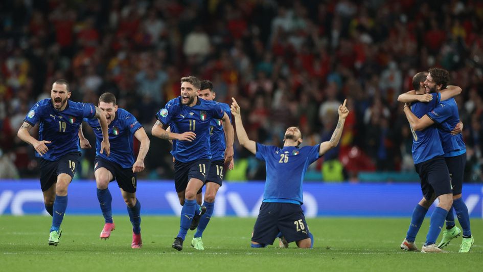 Italy celebrate winning on penalties against Spain