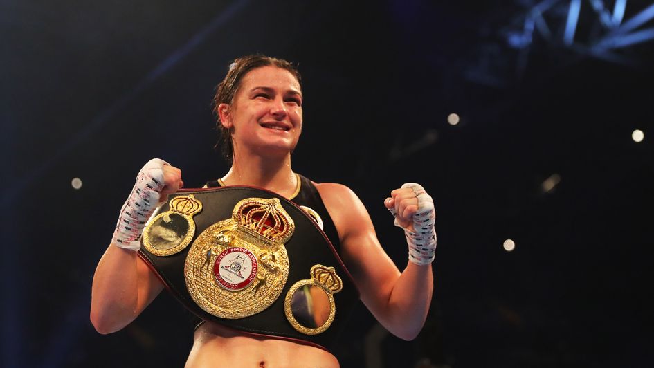 Katie Taylor celebrates her title win