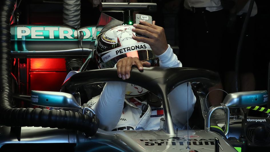 Lewis Hamilton finds time for a selfie after topping the time sheets