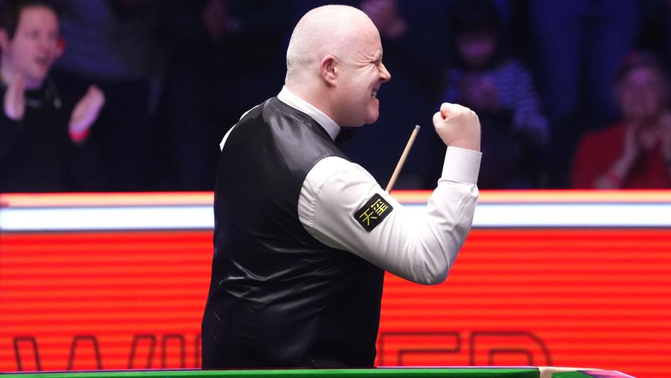 John Higgins celebrates a remarkable win