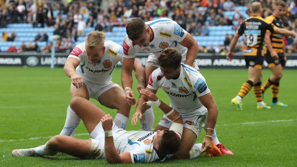 Henry Slade celebrates with his Exeter team-mates