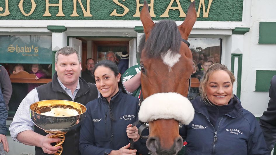 Gordon Elliott clutches the Grand National trophy