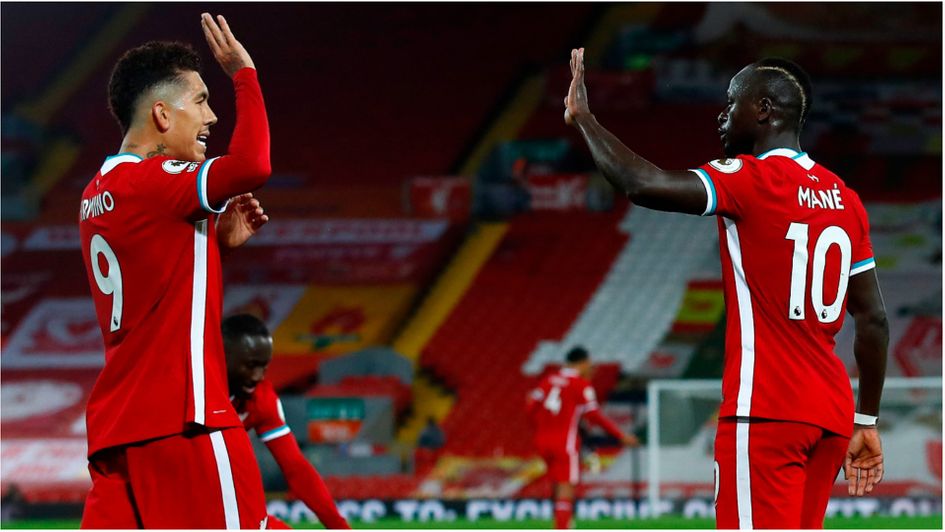 Roberto Firmino and Sadio Mane celebrate for Liverpool
