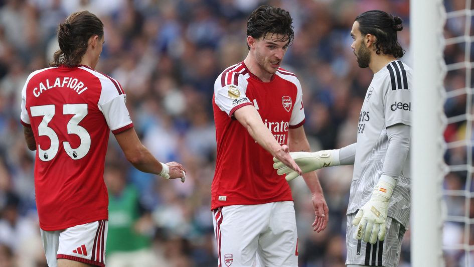 Arsenal players react during defeat to Brighton