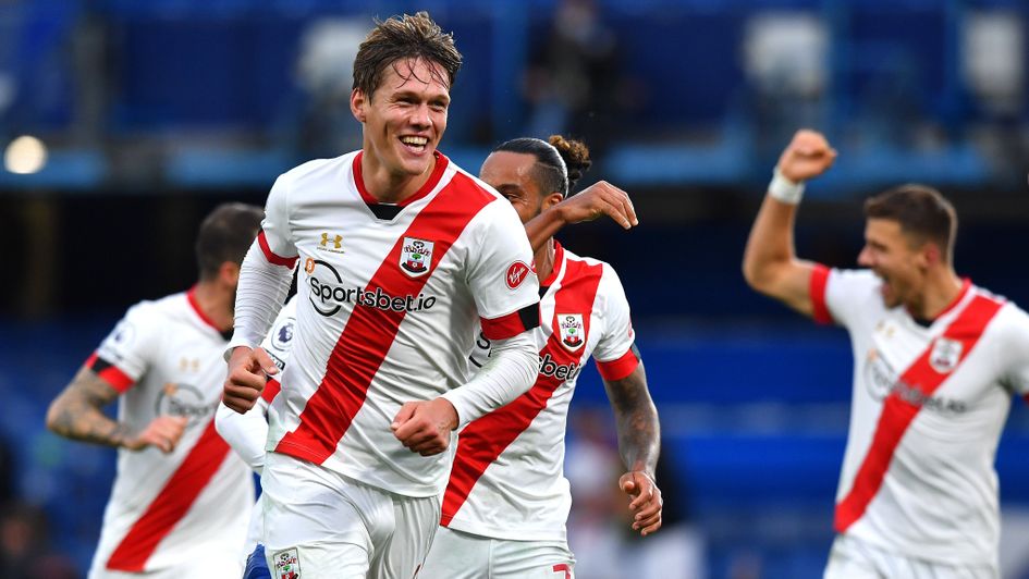 Jannik Vestergaard celebrates Southampton's late equaliser at Chelsea