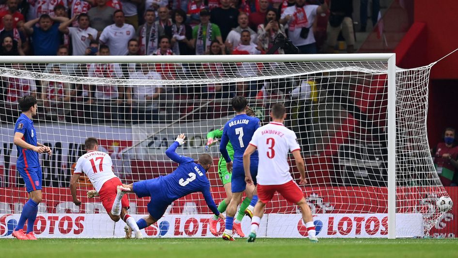 Damian Szymanski heads the ball past Jordan Pickford