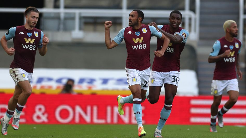 Ahmed Elmohamady celebrates Aston Villa's late equaliser at Newcastle