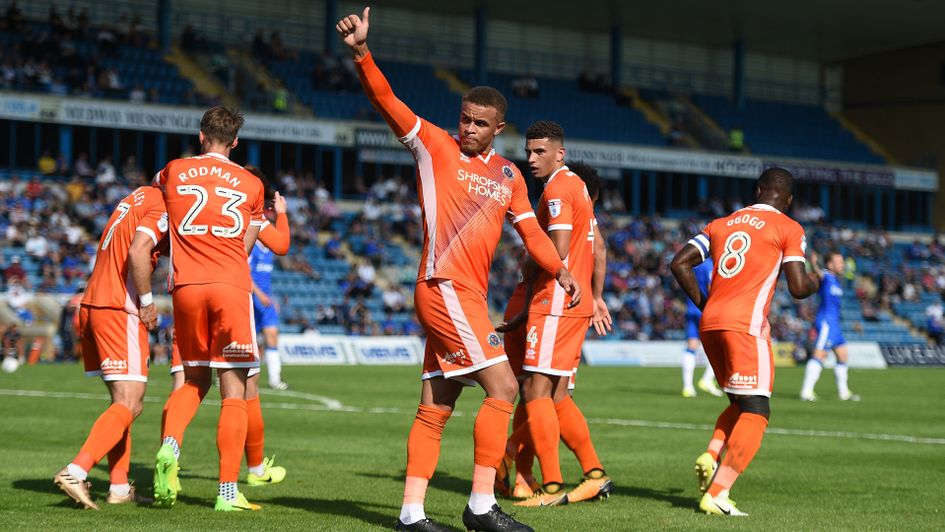 Shrewsbury striker Carlton Morris celebrates