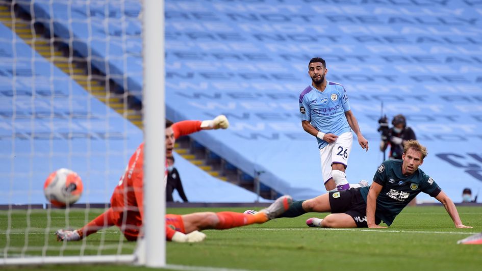 Manchester City's Riyad Mahrez scores