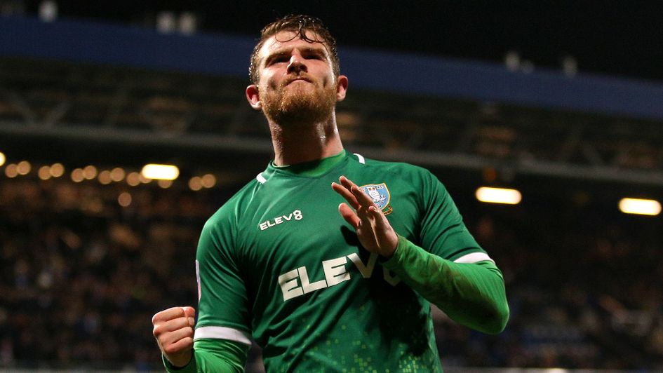 Sam Winnall celebrates his goal against QPR