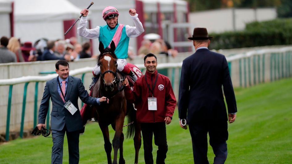 John Gosden greets Enable following her first Arc win