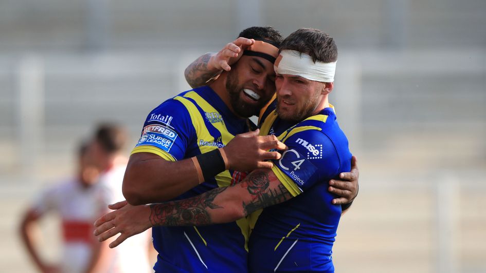 Warrington's Sitaleki Akauola celebrates scoring his side's first try