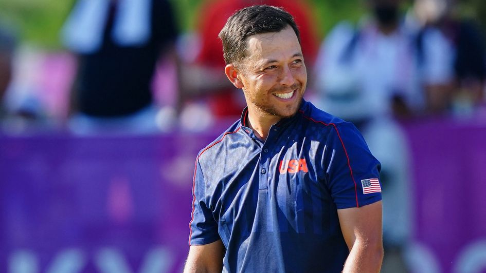 USA's Xander Schauffele celebrates after winning the gold medal