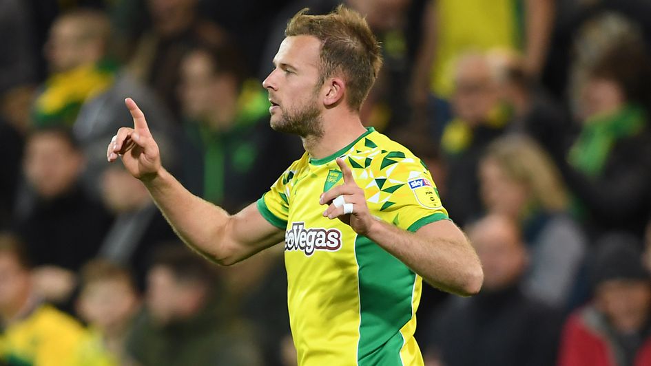 Jordan Rhodes celebrates his goal for Norwich against Aston Villa
