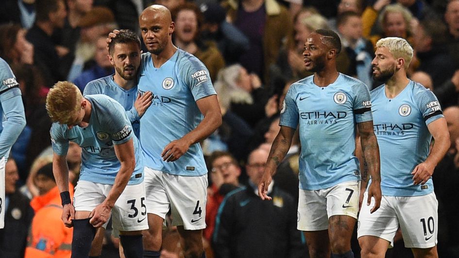 Vincent Kompany is congratulated after scoring