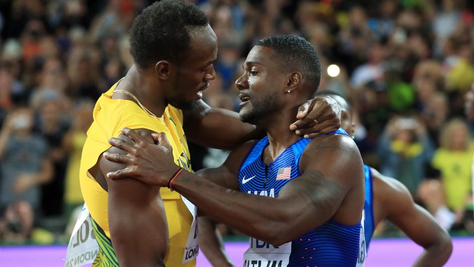 Usain Bolt (l) congratulates Justin Gatlin