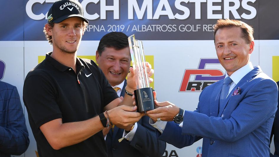 Thomas Pieters collects the trophy in Prague