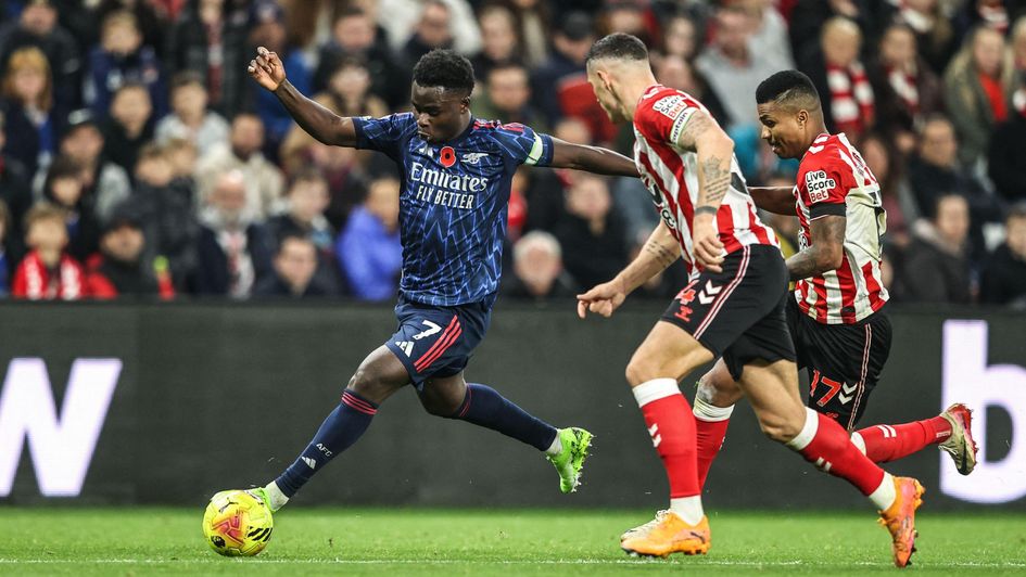 Granit Xhaka and Reinildo marshalling Bukayo Saka last season