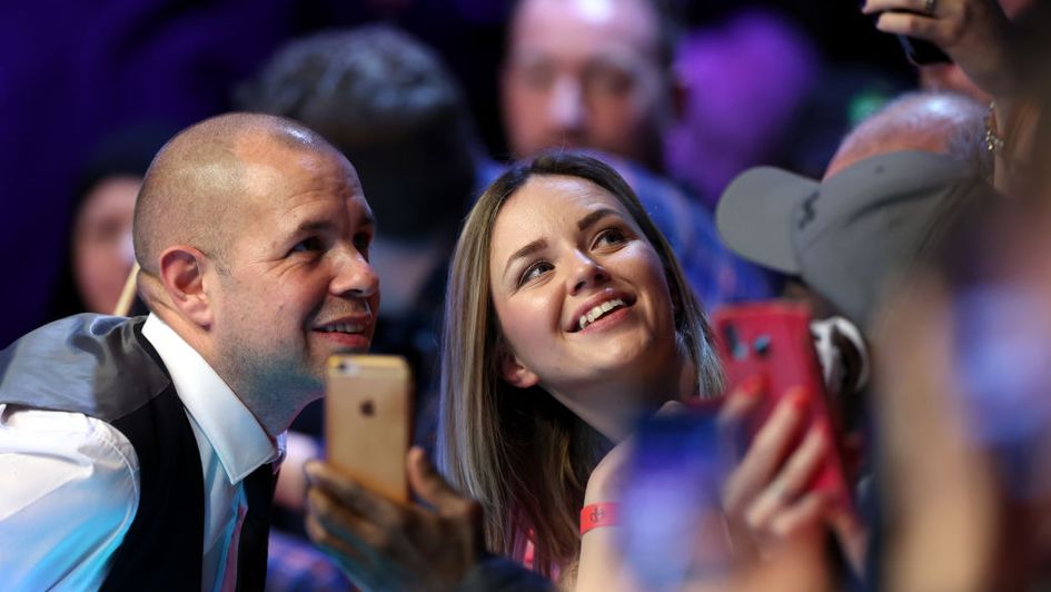 The man of the hour has his picture taken