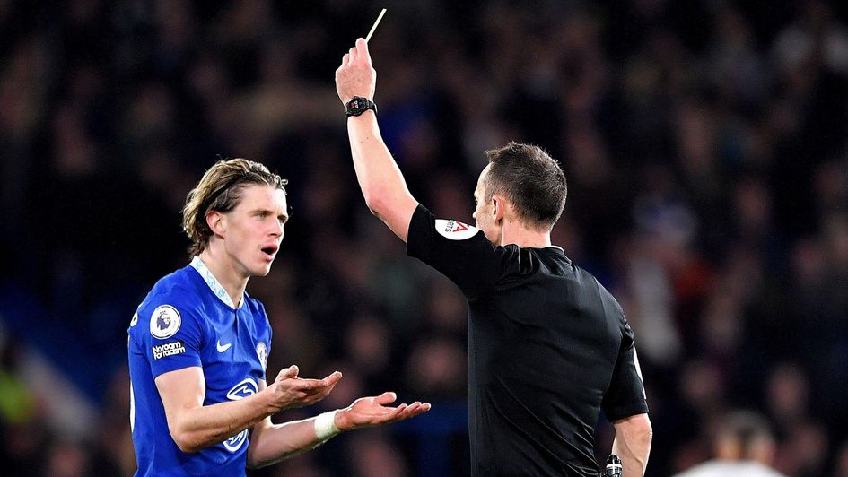 Conor Gallagher receives a yellow card