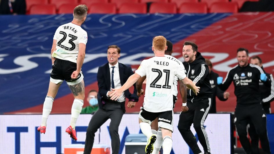 Joe Bryan: Fulham left-back celebrates with manager Scott Parker after scoring in extra-time of the Sky Bet Championship play-off final