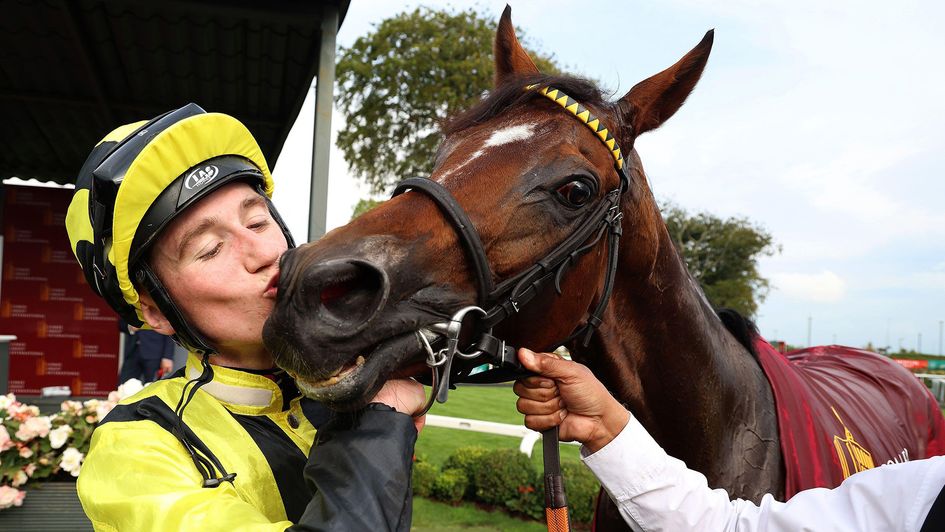 David Egan gives Eldar Eldarov a kiss at the Curragh