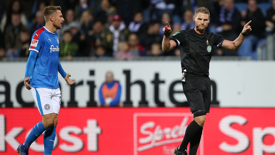 Referee Timo Gerach awards a penalty to Bochum after a VAR check