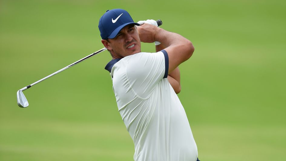 Brooks Koepka plays a shot on day one in Texas