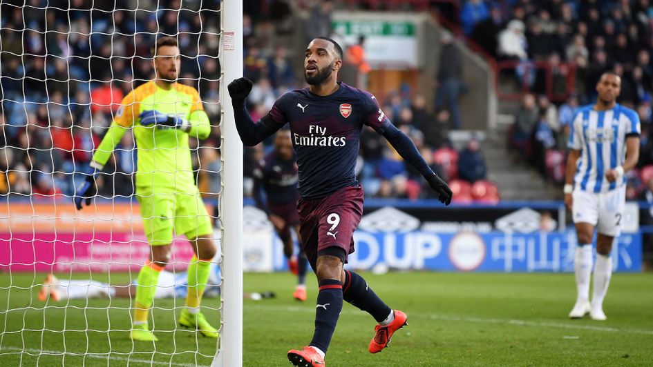 Alexandre Lacazette celebrates scoring for Arsenal at Huddersfield