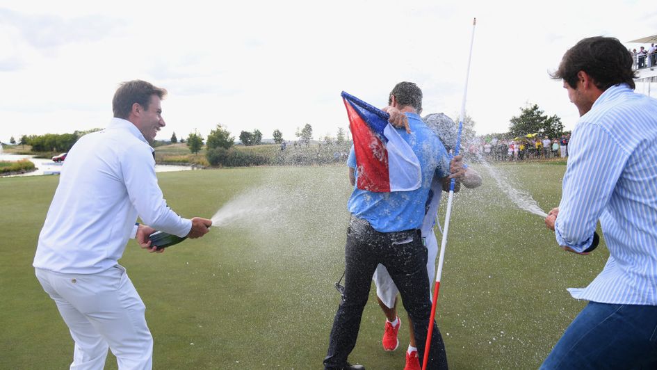 Andrea Pavan is showed with champagne after winning in Prague