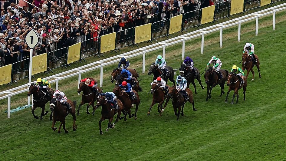 Edward Lewis (light blue, quartered cap) in action at Royal Ascot