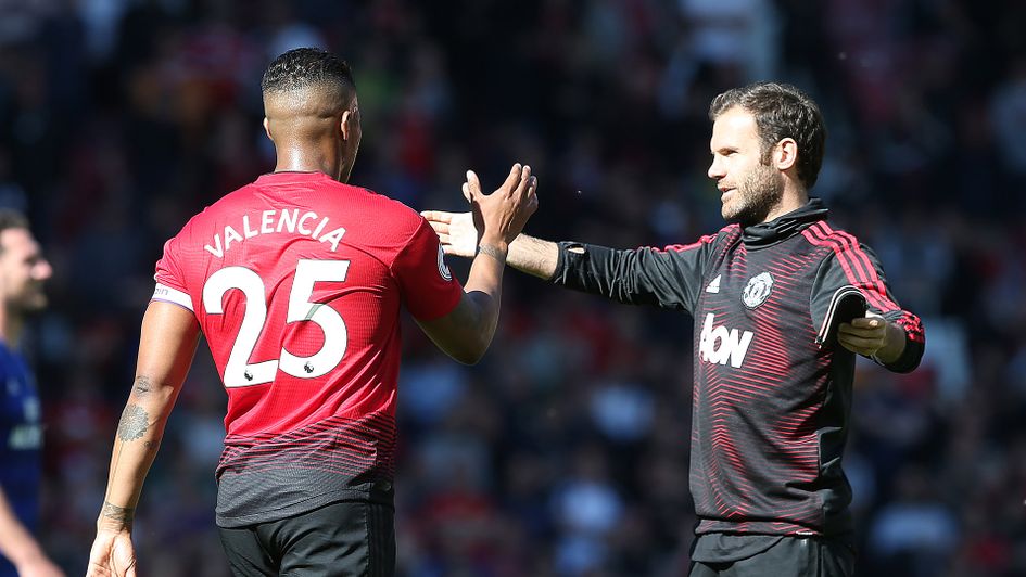 Antonio Valencia and Juan Mata