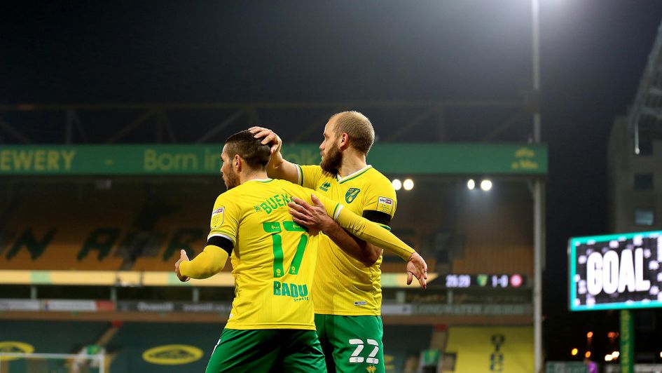 Emi Buendia and Teemu Pukki celebrate a Norwich goal