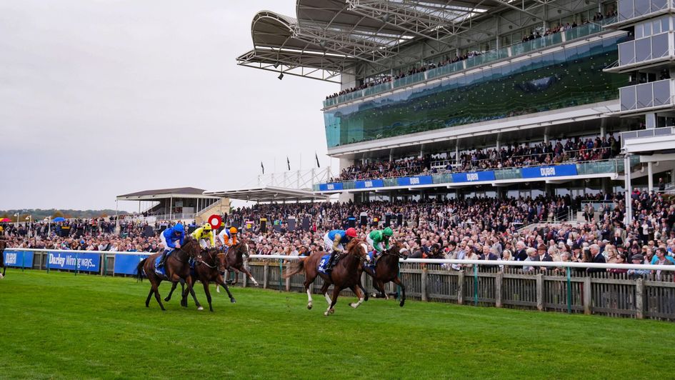 Damysus (red cap) wins the Darley Stakes