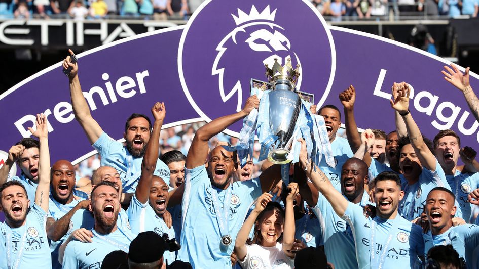 Manchester City lift the 2017/18 Premier League trophy