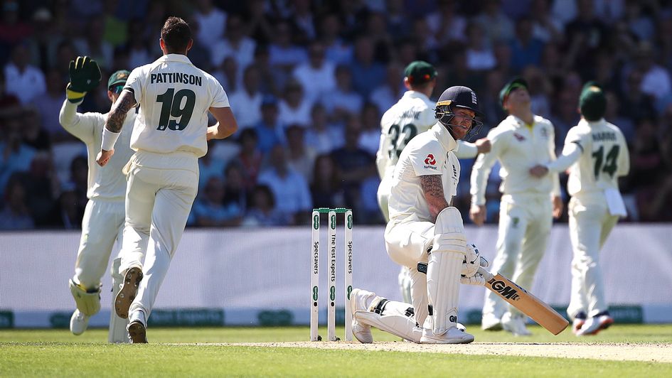 Ben Stokes reacts after being caught in the slips by David Warner